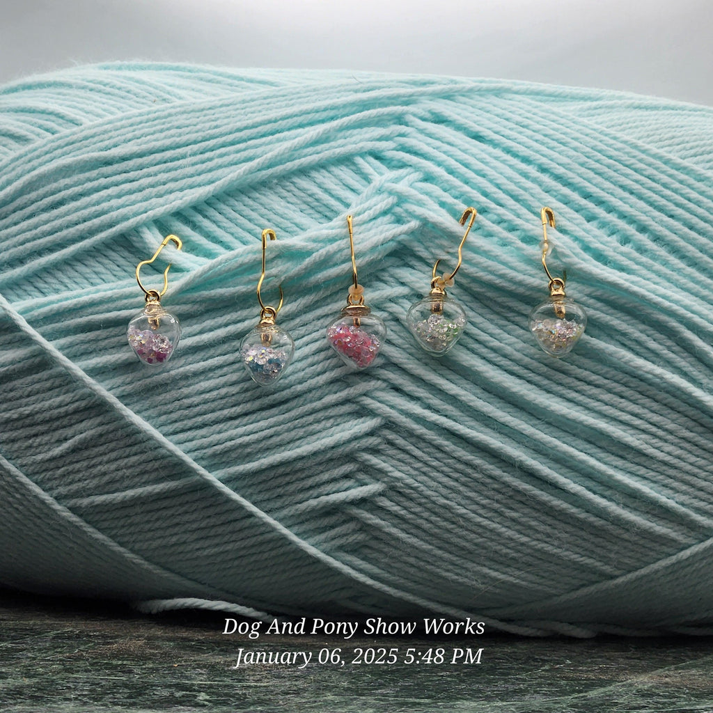 Glow in the dark heart crochet stitch markers.