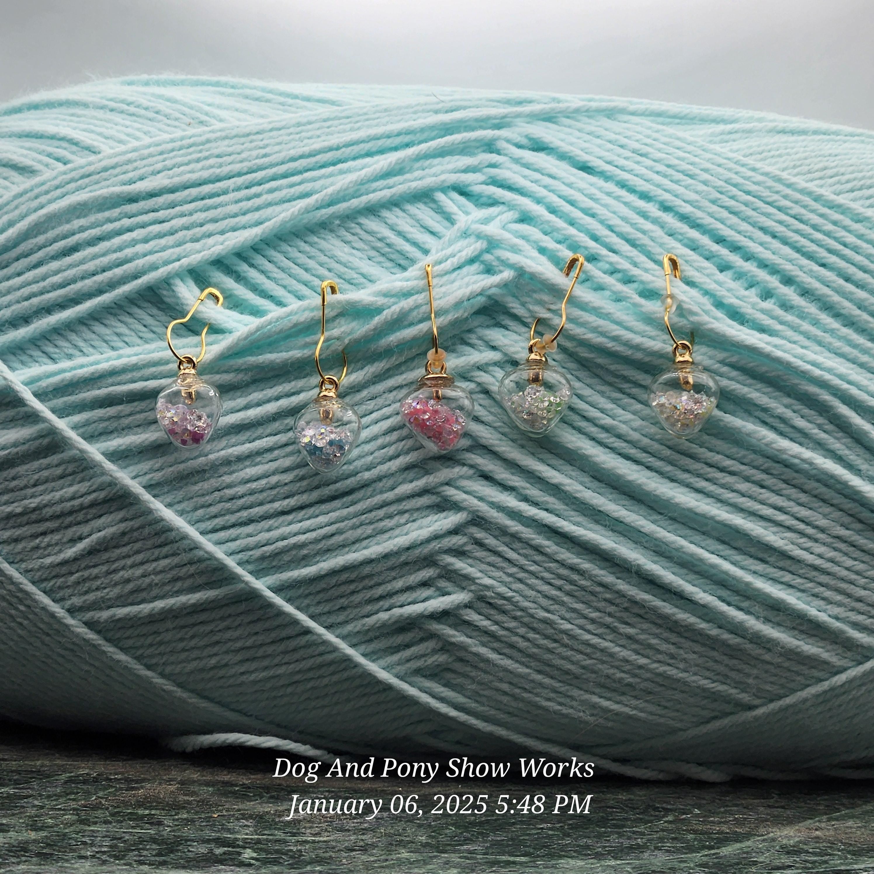 Glow in the dark heart crochet stitch markers.